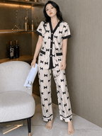 Off White Midnight Bow Printed Night Suit | V-Neck Button Pajama Set | omii.pk